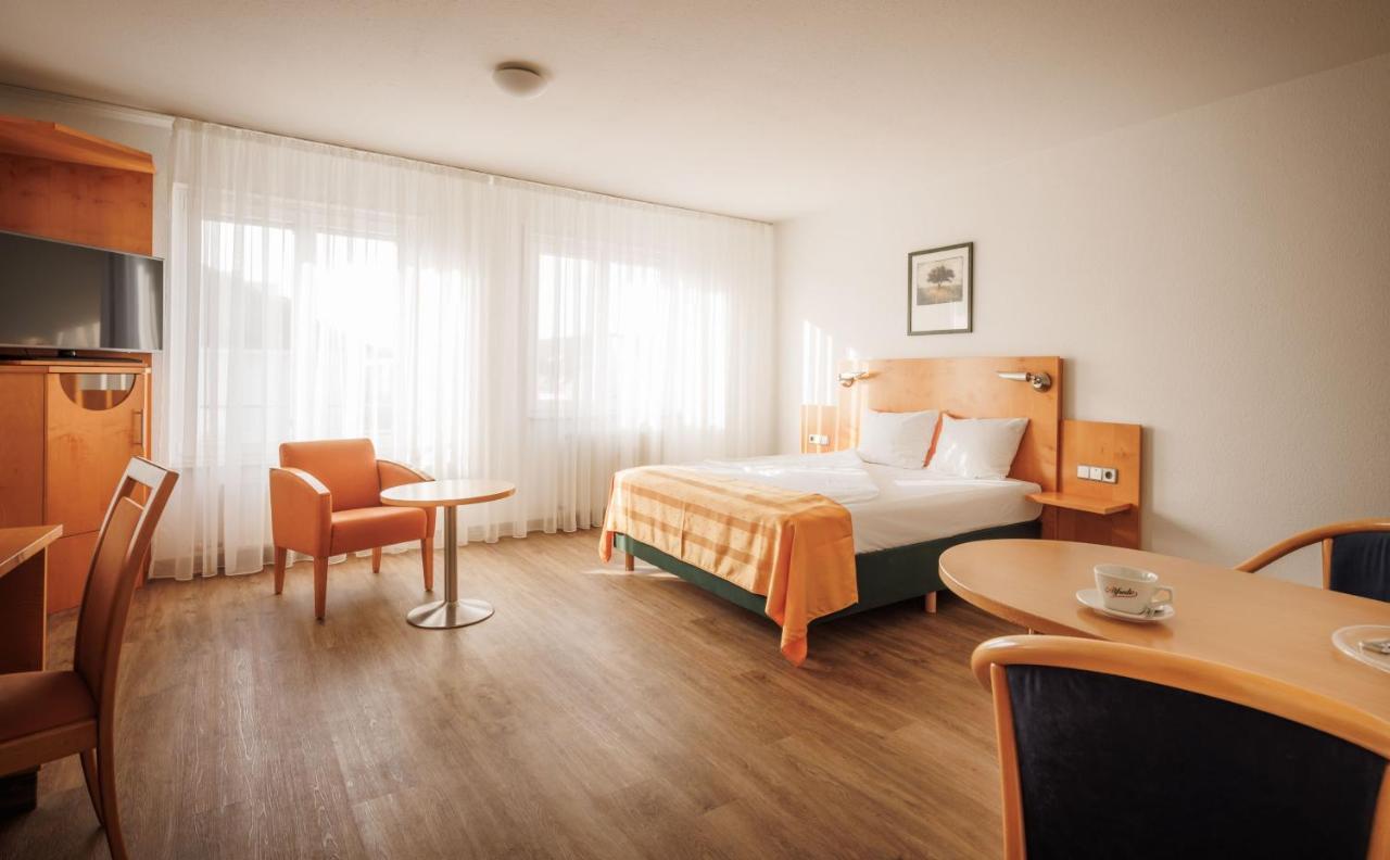 Aparthotel Ariva Boardinghouse Platanenhof à MHG Extérieur photo